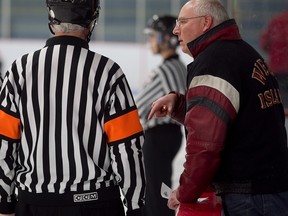 Dan Evans talks to the ref during a game.