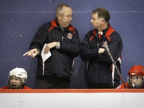 Pat Haney, left, and Ed Vlasic coach the West Island bantam CC hockey team in Beaconsfield.