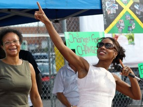 Nelligan MNA Yolande Jame in 2012 when she was  Family Minister. Here, she does her best Olympic sprinter Usain Bolt imitation during festivities to celebrate the 50th anniversary of Jamaican independence in Dollard des Ormeaux.