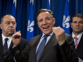 Coalition Avenir Quebec Francois Legault, centre, is promising he'll make sure that a deal between the FTQ Solidarity Fund and Claude Blanchet, husband of Quebec premier Pauline Marois, will become an issue in the next provincial election campaign  THE CANADIAN PRESS/Jacques Boissinot