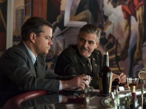 Matt Damon (left) and George Clooney in Columbia Pictures' The Monuments Men. Courtesy of Sony Pictures.