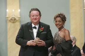 Filmmaker Peter Wintonick, left, receives the 2006 Governor General's Award in Visual and Media Arts from Governor-General of Canada Michaëlle Jean. (Courtesy Mira Burt Wintonick)