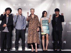 (L to R) Director Bong Joon-Ho, actors Chris Evans, Tilda Swinton, Ko A-Sung and Song Kang-Ho at the Snowpiercer press conference on July 29, 2013 in Seoul, South Korea.  (Chung Sung-Jun/Getty Images)