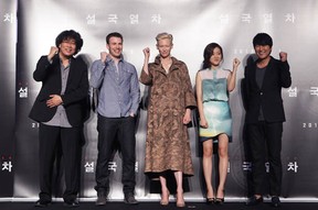 (L to R) Director Bong Joon-Ho, actors Chris Evans, Tilda Swinton, Ko A-Sung and Song Kang-Ho at the Snowpiercer press conference on July 29, 2013 in Seoul, South Korea.  (Chung Sung-Jun/Getty Images)