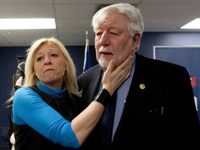 A supporter says goodbye to Liberal MNA Henri-Francois Gautrin who has served for 25 years after he announced during a press conference   in Montreal on Friday February 28, 2014, he will not seek re-election. Gautrin will be replaced by Jacques D'Aoust, the former president of Investissement Quebec. (Allen McInnis / THE GAZETTE)