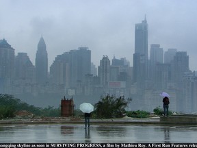 The Chongqing skyline as seen in SURVIVING PROGRESS, a film by Mathieu Roy. A First Run Features release.