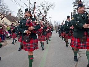 The Black Watch pipes and drums band marches down Main St. at the St-Patrick's Day parade in Hudson on March 16, 2013.