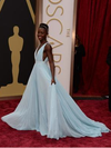 Lupita Nyong’o in Prada plunge.