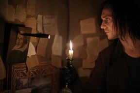 Tom Hiddleston, as the vampire Adam, glares at a portrait of William Shakespeare, in a scene from the Jim Jarmusch film Only Lovers Left Alive.