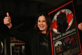 Ozzy Osbourne accepts platinum records from Universal Music Canada at Black Sabbath’s Montreal press conference (Photo by Mitch Lafon)