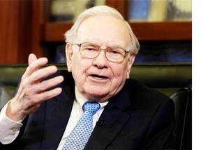 Berkshire Hathaway Chairman and CEO Warren Buffett gestures during an interview with Liz Claman on the Fox Business Network in Omaha, Neb., Monday, May 5, 2014, after the annual Berkshire Hathaway shareholders meeting.