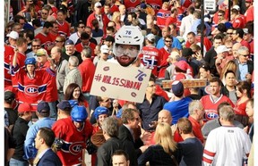 Canadiens fans fill Rue Des Canadiens outside the Bell Centre prior to Game 6 of Stanley Cup playoff series against the Boston Bruins in Montreal Monday May 12, 2014.