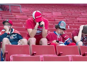 Canadiens fans watching Game 6 on the Bell Centre Jumbotron react to their team’s loss to the Rangers in Game 6 of the Eastern Conference final on Thursday night.