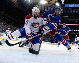 Canadiens forward Thomas Vanek battles defenceman Ryan McDonagh for position in front of the Rangers net during Game 6 of the Eastern final in New York.