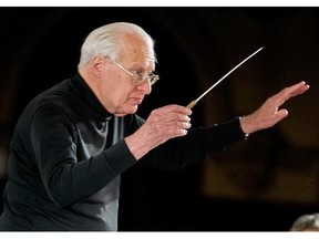 Franz-Paul Decker conducts an OSM rehearsal at St-Jean-Baptiste Church in October 2008. The German native raised the orchestra to a new technical level in the late 1960s.