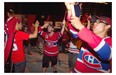 Fans celebrate the series win by the Habs outside the Bell Centre following Game 7 on Wednesday May 14, 2014.