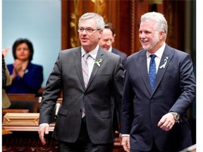 “We have to rebuild the credibility of our system of access demands,” says government house leader Jean-Marc Fournier, with Premier Philippe Couillard at the National Assembly in February.