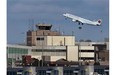 An Air Canada passenger jet takes off over the terminal at Halifax Stanfield International Airport in Halifax on Jan. 21, 2013. Air Canada is reporting a first-quarter net loss of $341 million, or $1.20 per diluted share, as it was impacted by a lower Canadian dollar.