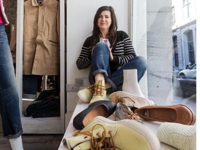 Lysanne Pepin, wearing Fretons, in her Espace Pepin storefront window among Shabbies and Fretons shoes on Wednesday, May 21, 2014. (Dave Sidaway / THE GAZETTE)