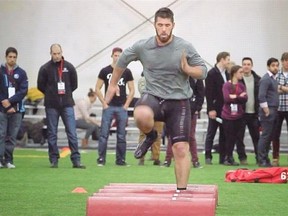 McGill University football player Laurent Duvernay-Tardif runs through a drill during his pro day in front of NFL and CFL scouts at the Catalogna Soccerplexe in the Lachine borough of Montreal Thursday March 27, 2014.