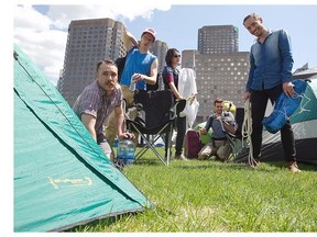 Members of the cast of the NoShow show set up camp at the esplanade of Place des Arts on Wednesday. The show, which is part of Festival TransAmériques, opened the festival on Thursday.