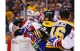 Milan Lucic #17 of the Boston Bruins shoves Alexei Emelin #74 of the Montreal Canadiens into the goal in the third period in Game Two of the Second Round of the 2014 NHL Stanley Cup Playoffs at TD Garden on May 3, 2014 in Boston, Massachusetts.