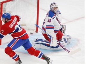 Montreal Canadiens centre Alex Galchenyuk, left, celebrates scoring against New York Rangers goalie Henrik Lundqvist during game 5 NHL Eastern Conference action at the Bell Centre in Montreal on Tuesday May 27, 2014.