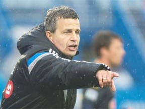 Montreal Impact’s coach Frank Klopas reacts on the sideline during second half MLS soccer action between the Impact and the Philadelphia Union in Montreal, Saturday, April 26, 2014.