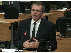 Luc Berthold, the chief of staff to former transport minister Julie Boulet, testifies before the Charbonneau Commission on Monday, May 12, 2014.