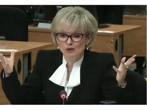 Former Quebec transport minister Julie Boulet testifies at the Charbonneau Commission Wednesday, May 14, 2014 in Montreal.