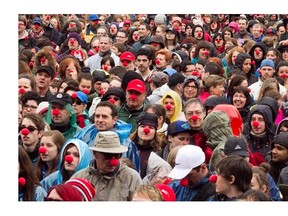 Montrealers attempt a Guinness World Record for most people wearing clown noses in one place during event in Place des Festivals to support Nez Pour Vivre, a foundation that helps young adults 18-30 years old suffering from cancer, on Sunday, May 4, 2014.