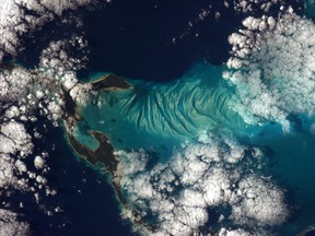 The beauty of the Bahamas is surreal; every blue that exists. Taken on New Year's Day, 2013 from the Space Station.