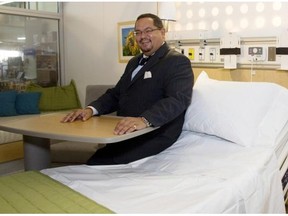 Arthur Porter is pictured in 2007 in a mock-up of the proposed rooms to be built in the McGill University Health Centre. The Gazette has obtained new details of Porter’s pay and perks during his tenure at the MUHC.