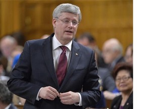 Prime Minister Stephen Harper responds to a question in the House of Commons on Tuesday, May 27, 2014. A Globe and Mail report on Harper's attempt to appoint Marc Nadon to one of the three Supreme Court of Canada seats reserved for Quebec has provoked a furor in the House.