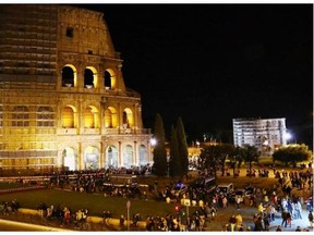 People visit the Colosseum during the ‘Night of the Museums’ in Rome, Italy, 17 May 2014. During the cultural event museums stay open late night.