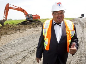 In this file photo from June of 2010, then MUHC CEO Dr. Arthur Porter was all smiles as construction started at the McGill University Health Centre super hospital at the Glen Campus. According to figures obtained by The Gazette, Porter could afford to be jolly - in 2010 he was paid  nearly  than $322,000, about $137,000 over and above his base salary and a sum which included a bonus for being "available" to do his job. Porter is now in custody in Panama, fighting extradition to Quebec to face fraud charges (John Kenney/THE GAZETTE)