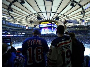 Rangers fans cheer prior to Game Three of the Eastern Conference final between the New York Rangers and the Canadiens during the 2014 NHL Stanley Cup Playoffs at Madison Square Garden on May 22, 2014, in New York City.