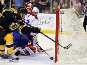 Matt Fraser #25 of the Boston Bruins taps in a puck after a score by teammate Carl Soderberg #34 against the Montreal Canadiens during Game Five of the Second Round of the 2014 NHL Stanley Cup Playoffs at the TD Garden on May 10, 2014 in Boston.