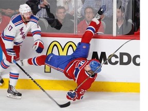 Montreal Canadiens left wing Max Pacioretty (67) leaps from the bench as teammates celebrate a 3-1 win over the Boston Bruins in Game 7 of a second-round NHL hockey Stanley Cup playoff series, in Boston on Wednesday, May 14, 2014. The Canadiens advanced to the Eastern Conference finals against the New York Rangers.