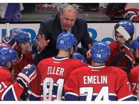 Canadiens head coach Michel Therrien speaks to his team during a time out that was called after the New York Rangers took an early 2-0 lead in the Eastern Conference Final at the Bell Centre in Montreal on Saturday.