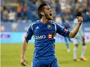 Montreal Impact's Blake Smith celebrates after scoring against Sporting Kansas City during the second half in MLS soccer action in Montreal, Saturday, July 27, 2013.