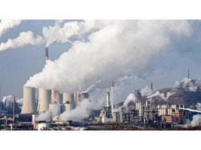 Steam and smoke rise from a coal-powered generating station in Gelsenkirchen, Germany. Research into capturing the carbon dioxide formed in combustion processes before it is released into the atmosphere — and then finding a way to convert it into useful compounds — is gaining momentum, Joe Schwarcz writes.