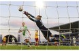 Tyreso’s Brazilian forward Marta (not in picture) scores past Wolfsburg’s goalkeeper Almuth Schult during the UEFA Women’s Champions League final football match Tyreso FF vs Vfl Wolfsburg at Restelo stadium in Lisbon on May 22, 2014.