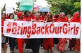 Women attend a demonstration calling on the government to rescue the kidnapped schoolgirls of the Chibok secondary school, in Abuja, Nigeria, Tuesday, May 13, 2014. A Nigerian government official said “all options are open” in efforts to rescue almost 300 abducted schoolgirls from their captors as US reconnaissance aircraft started flying over this West African country in a search effort.