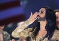 Conchita Wurst representing Austria celebrates after the second semifinal of the Eurovision Song Contest in the B&W Halls in Copenhagen, Denmark, Thursday, May 8, 2014.  She won the Eurovision Contest final on Saturday, May 10. (AP Photo/Frank Augstein)