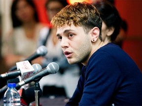 Xavier Dolan speaks to the media Monday upon his return from the Cannes Film Festival, where his film Mommy won the Jury Prize. Dolan may have entertained the possibility of becoming the youngest winner of the Palme d’Or, but was quick to note that “the jury recognized our work. They recognized our existence. It’s a jury of people I admire to no end. We could have been forgotten.”