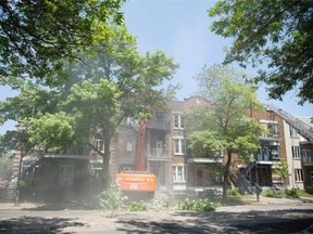 The aftermath of a five-alarm fire on Christophe-Colomb Ave. in Montreal on Monday June 9, 2014. 
 Vincenzo D’Alto/THE GAZETTE