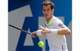 Britain’s Andy Murray returns against France’s Paul-Henri Mathieu during their second round match on day three of the ATP Aegon Championships tennis tournament at The Queen’s Club in west London, on June 11, 2014. Murray won in straight sets 6-4, 6-4.