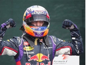 Red Bull F1 driver Daniel Ricciardo of Australia celebrates after finishing first in the Canadian Grand Prix at the Circuit Gilles Villeneuve in Montreal on Sunday, June 8, 2014.