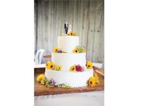 Fresh flowers adorn the chocolate and vanilla wedding cake.